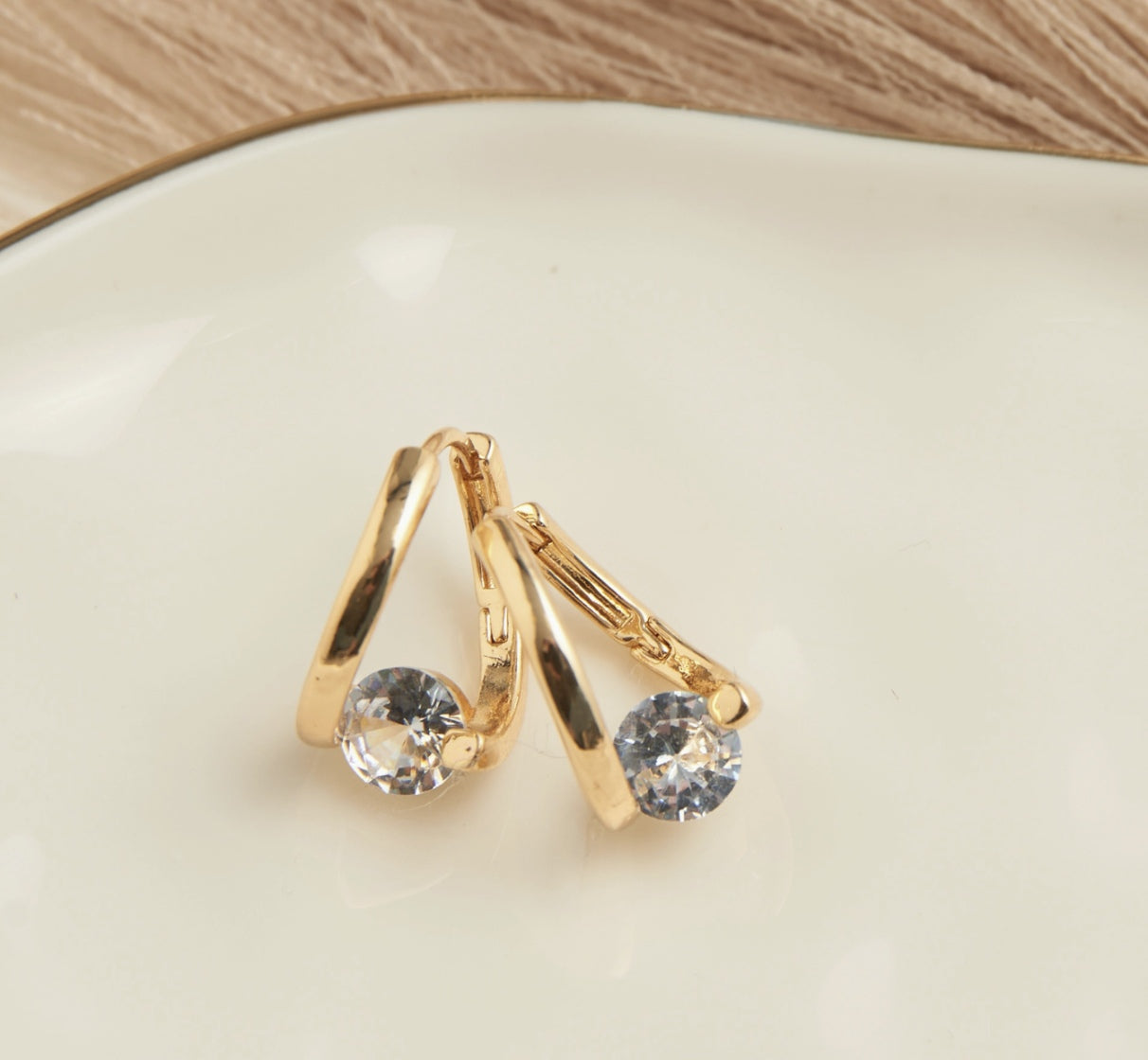 Dazzler Twist Cubic Zirconia Hoop Earrings