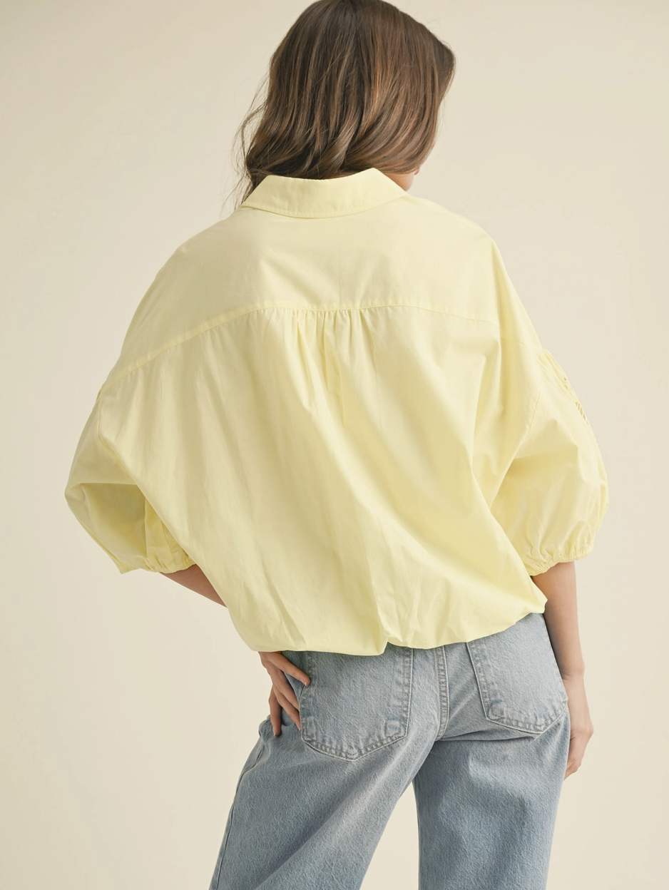 Cut Out Embroidered Bubble Sleeve Top